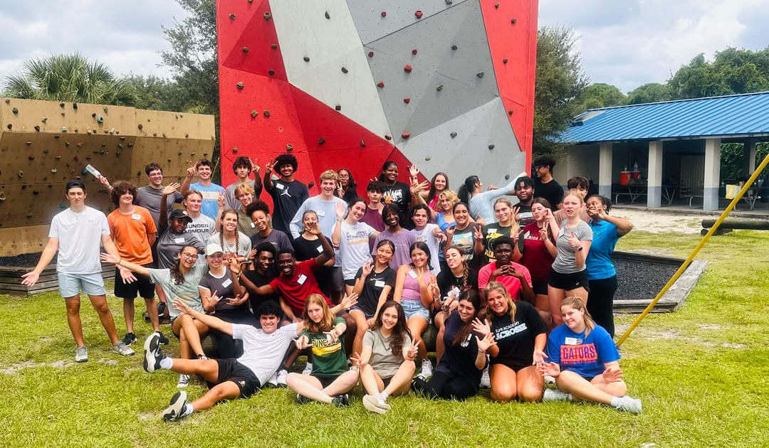 GROW group in front of climbing wall