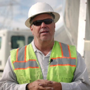 man in construction hi vis vest