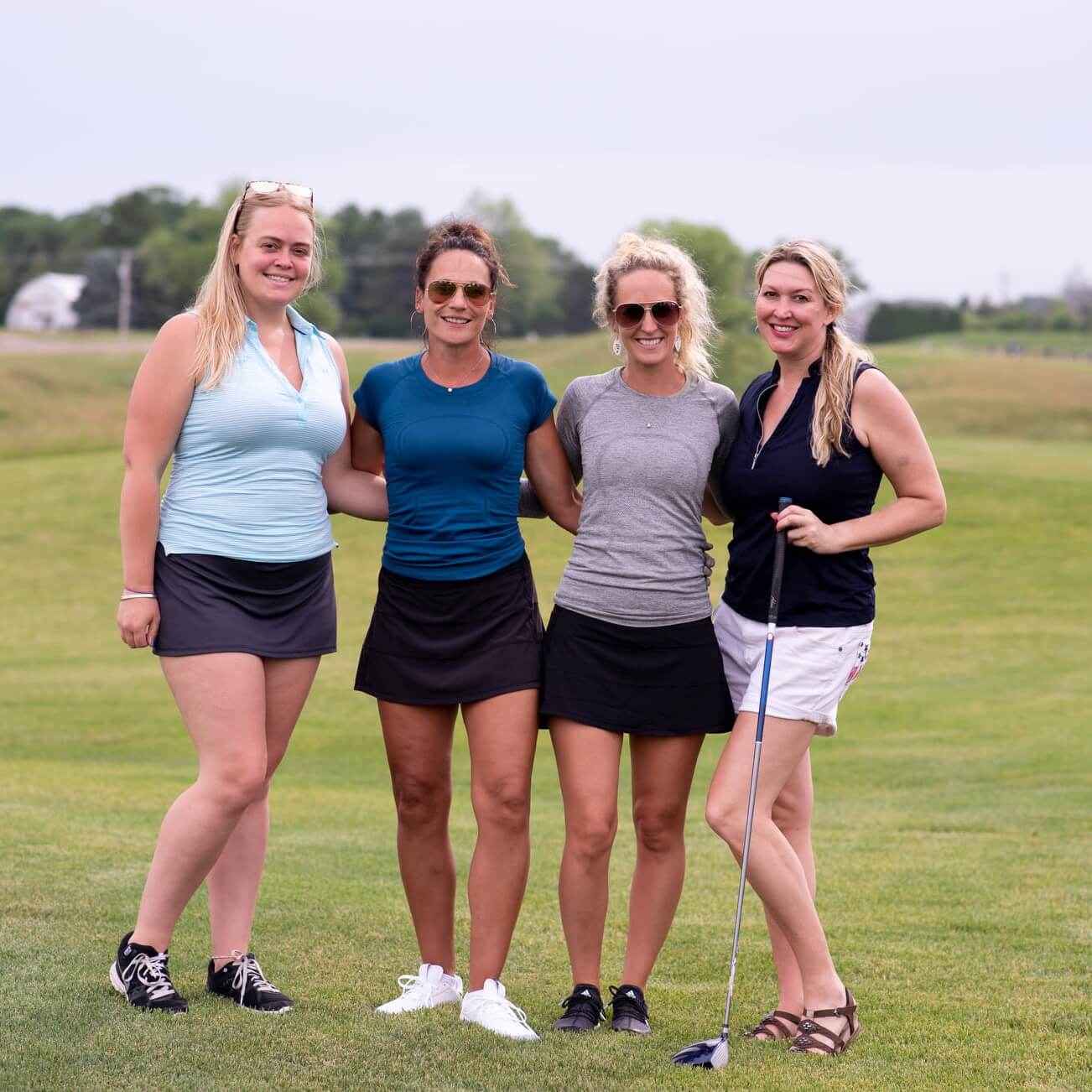 Ladies posing for photo at the 2024 Oregon Chamber Golf Outing