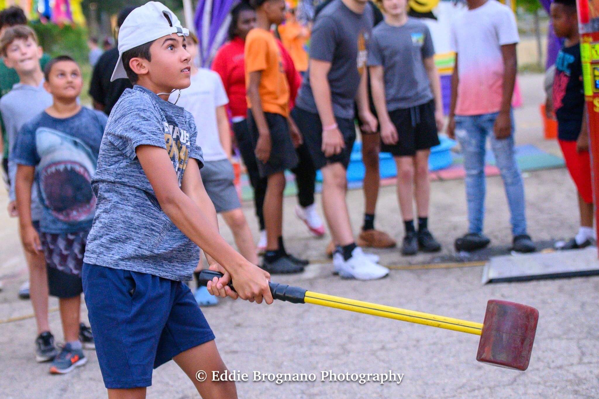 Kid playing a carnival game at the Oregon Summer Fest in Oregon, Wisconsin