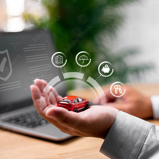 online handing holding a toy car