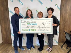 manna receiving a check