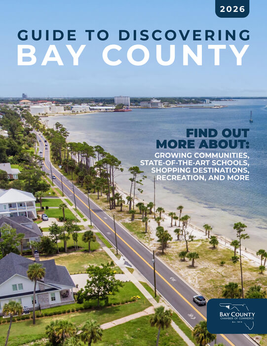 Cover of the 2026 Guide to Discovering Bay County featuring Beach Drive in Panama City, a road running along the waterfront of the bay.