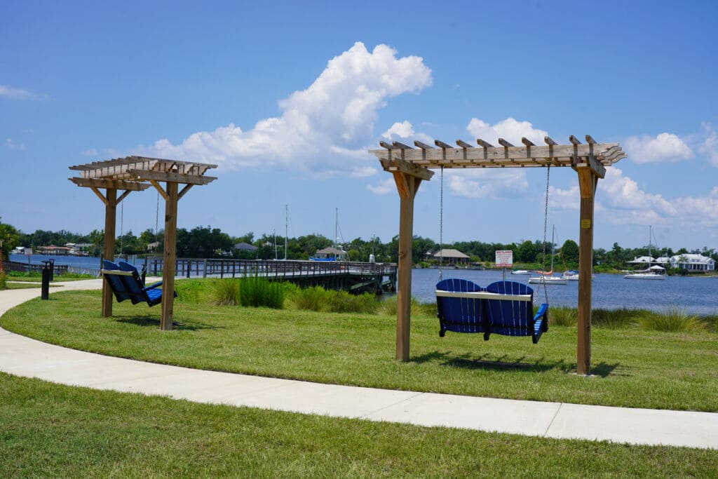 Waterfront park with swings overlooking St. Andrews Bay in Panama City, Florida