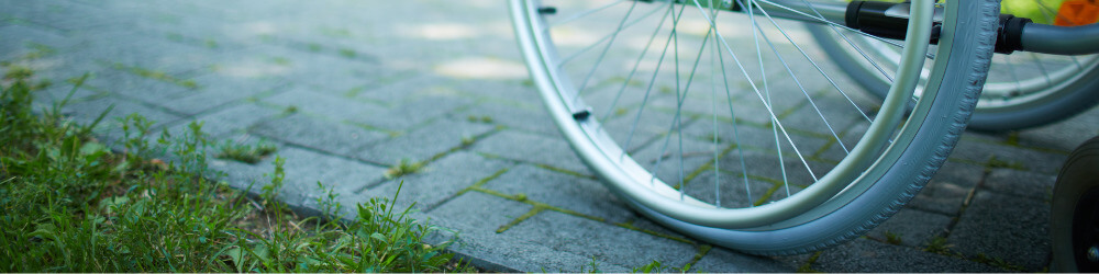 Wheelchair on brick path