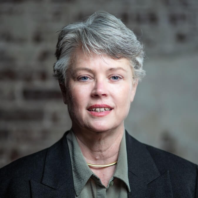 Robin Roberts Robin is smiling and has short hair and is wearing a black jacket