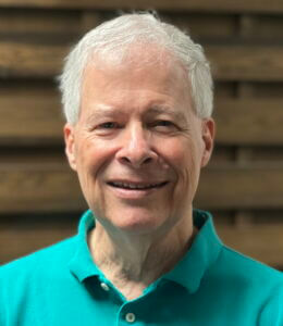 James Terry Headshot Jim is wearing a blue-green polo shirt