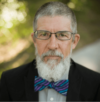 Geoff Ames Geoff is wering a blue bow tie