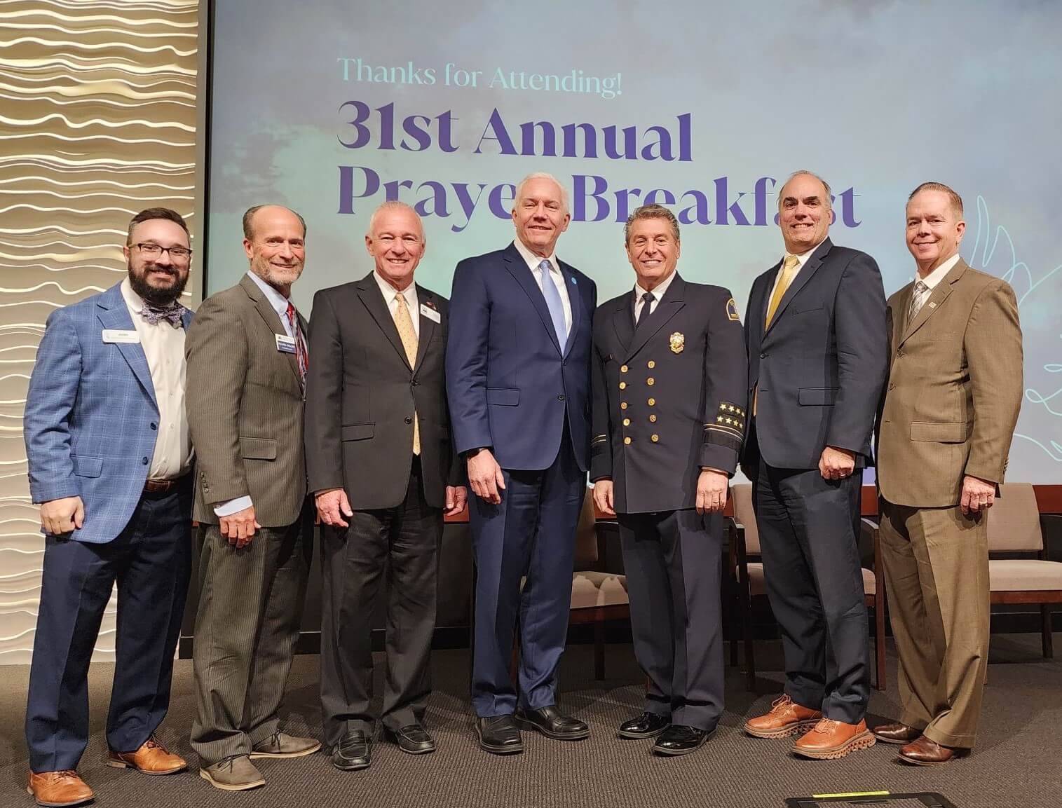 IMage of 4 mayors. chamber president, rep from IRC, and keynote speaker at Prayer Breakfast.