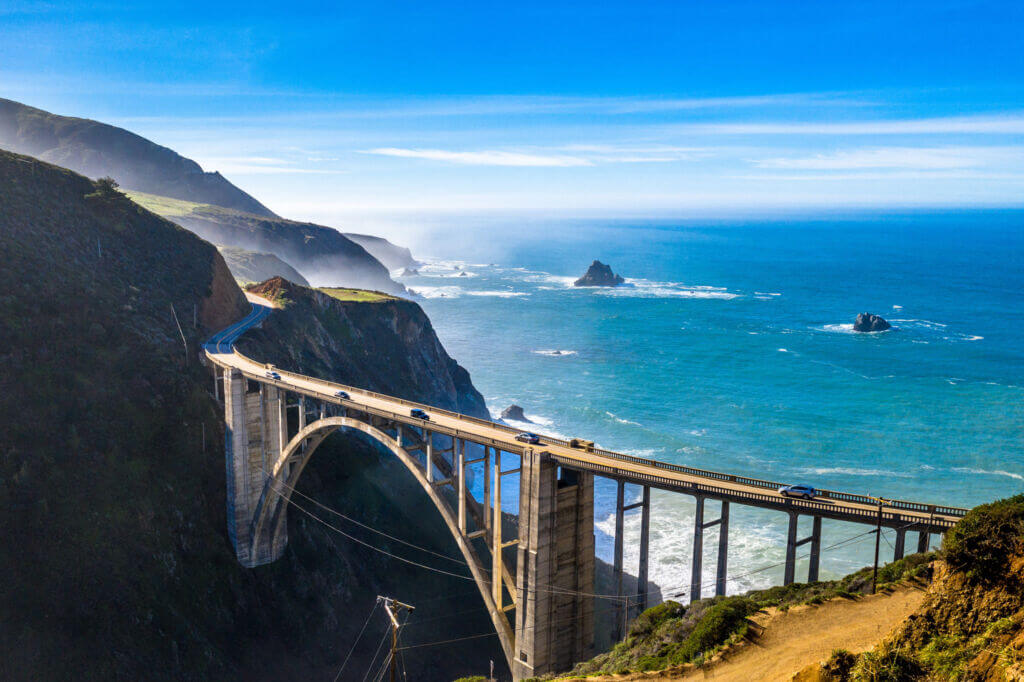 Big Sur landscape photo with water and bridge overpass