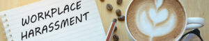 workplace harassment header on notebook