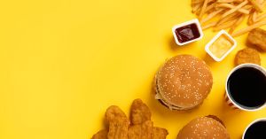 Fast Food on Yellow Background