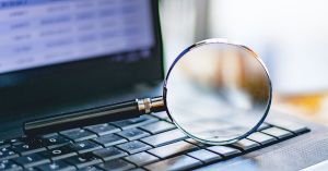 Magnifying Glass on Laptop