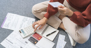 Woman Tracking Expenses