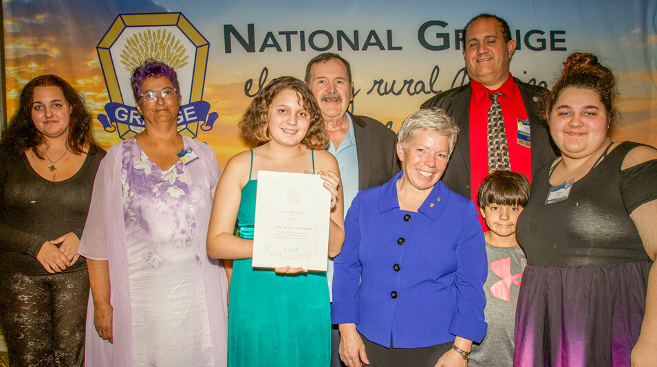 2024-legacy_family The Smith Family (IN) was recognized for 7 generations of Grange membership at the 158th Annual National Grange Convention in 2024