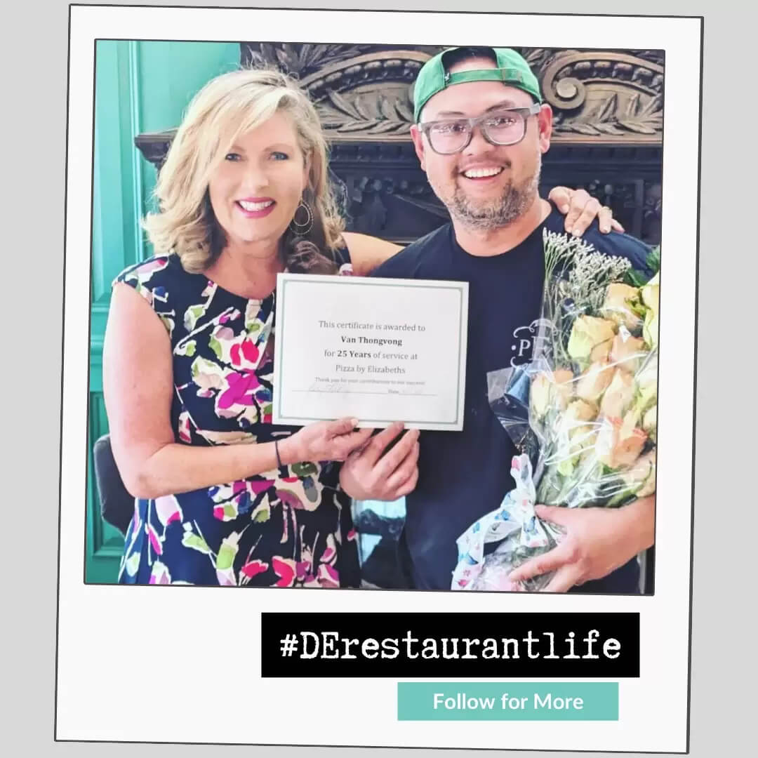 man holding certificate
