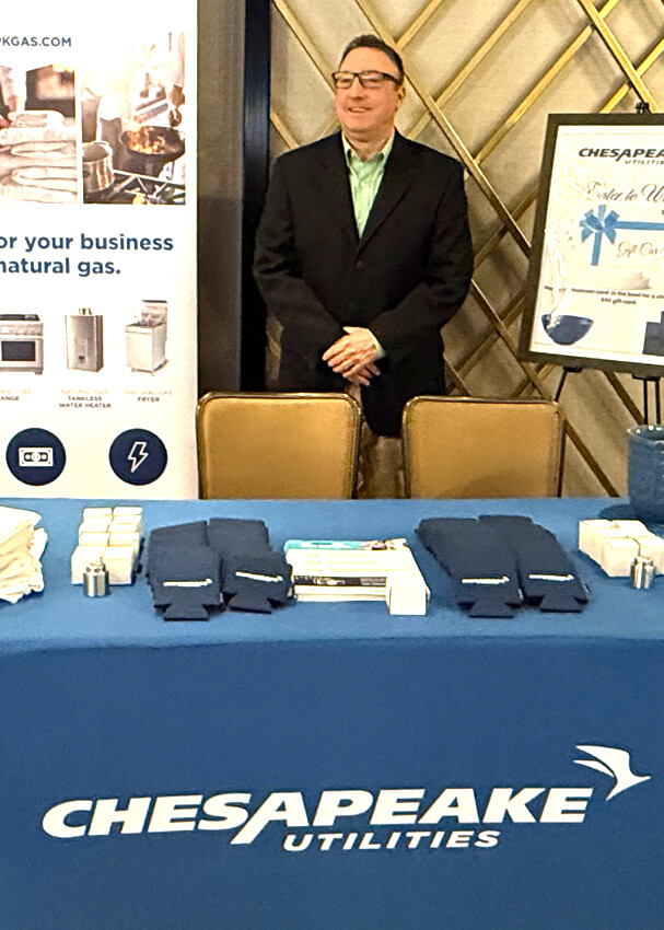 man in front of booth