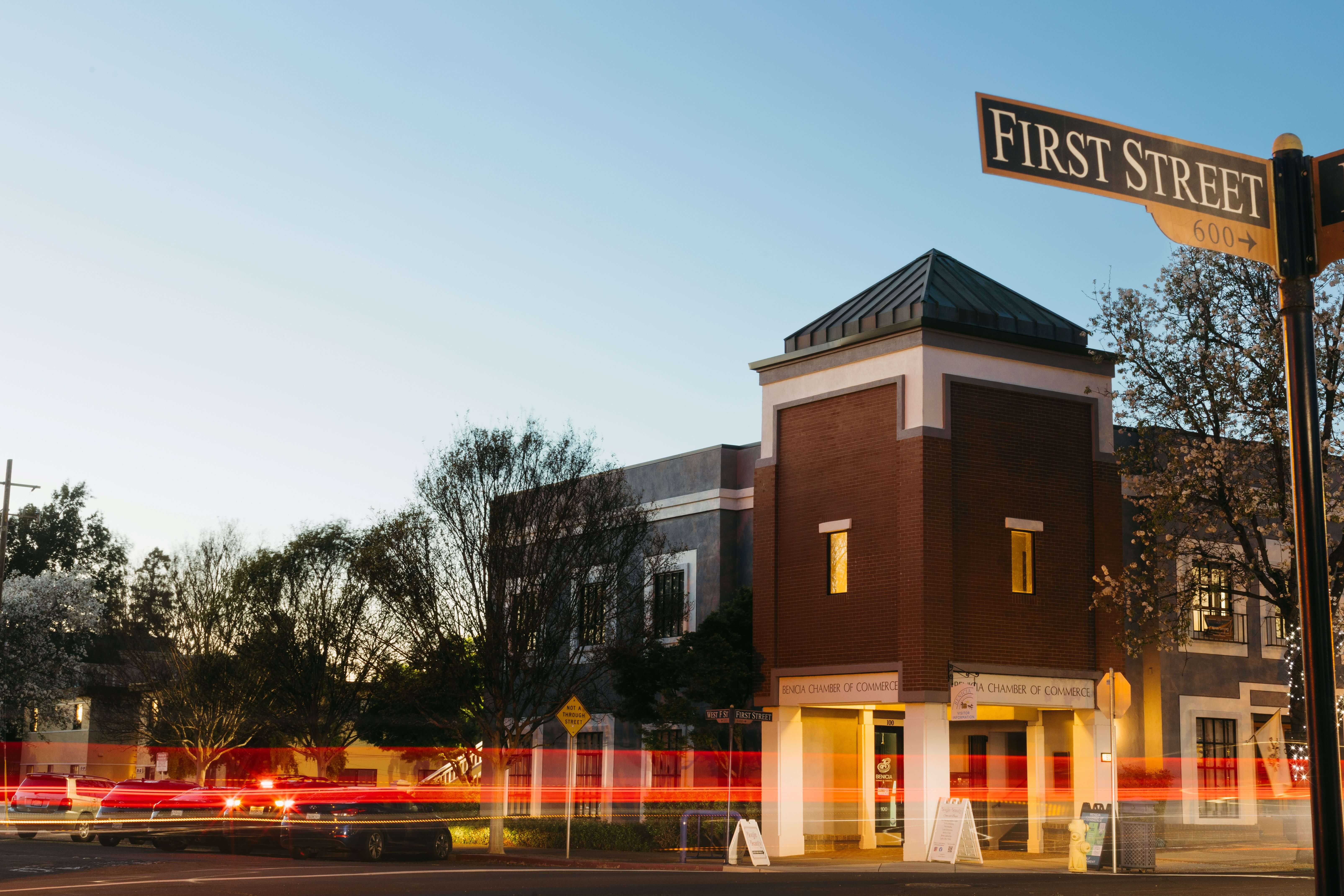 first street sign in front of chamber building