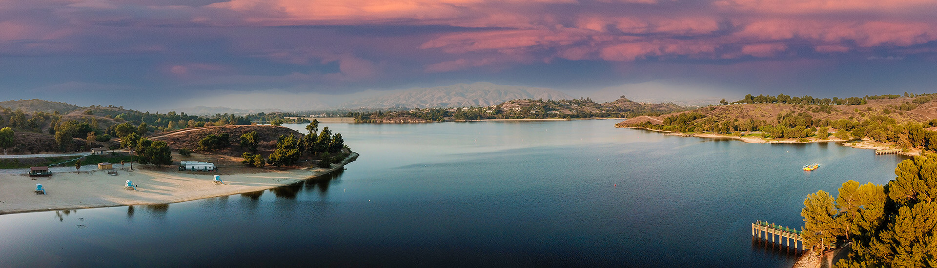 a breathtaking aerial panoramic shot of the still blue waters