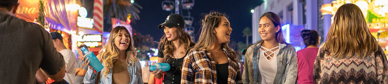 Fairplex A group of four young women enjoying an evening at the L.A. County Fair