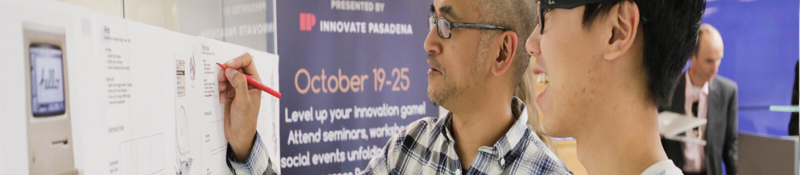 Innovate A teacher and young entrepreneur at an incubator in Pasadena