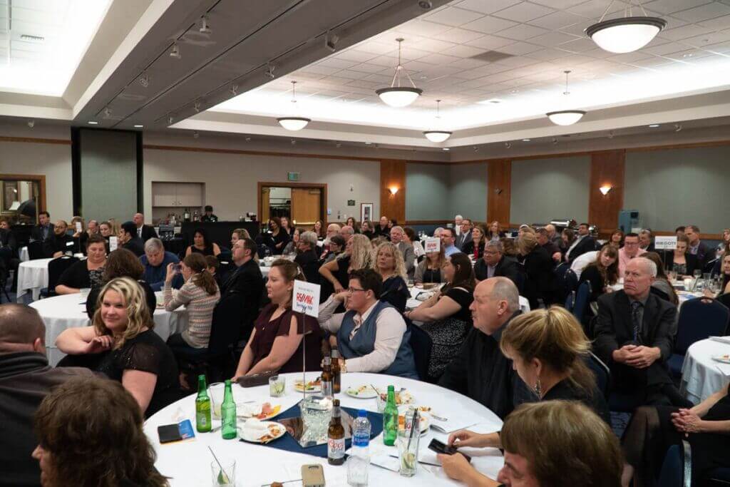 Burlington Chamber of Commerce members and local business leaders celebrating at the annual Awards of Excellence event in Burlington, Washington.
