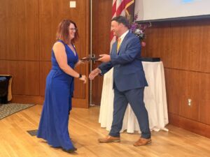 Steph Rees receives her IOM designation after completing Institute for Organization Management