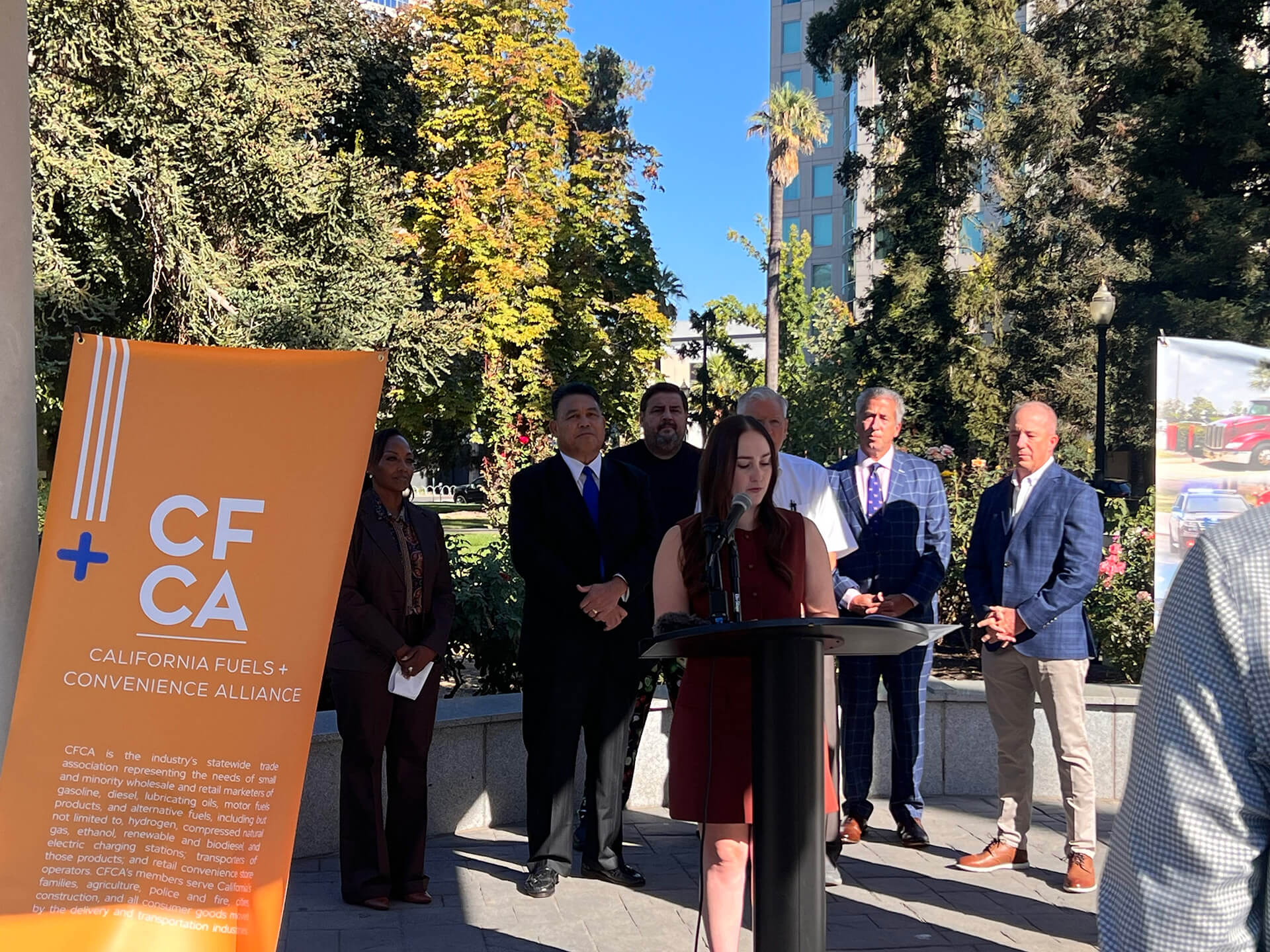woman speaking at podium