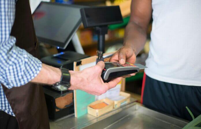 Checkout-aisle-at-a-grocery-store-pexels-696x448