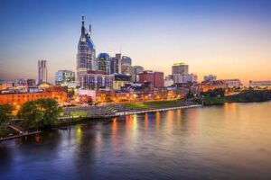 A photo of Nashville's downtown skyline on the Cumberland River.
