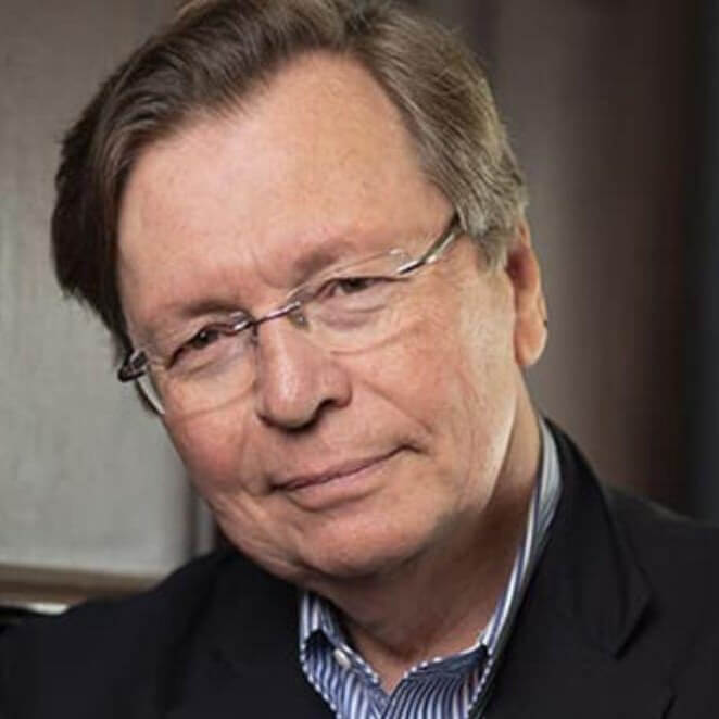 Headshot of journalist Chuck Lewis