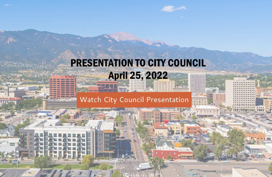 Aerial of downtown Colorado Springs with Pikes Peak in the background