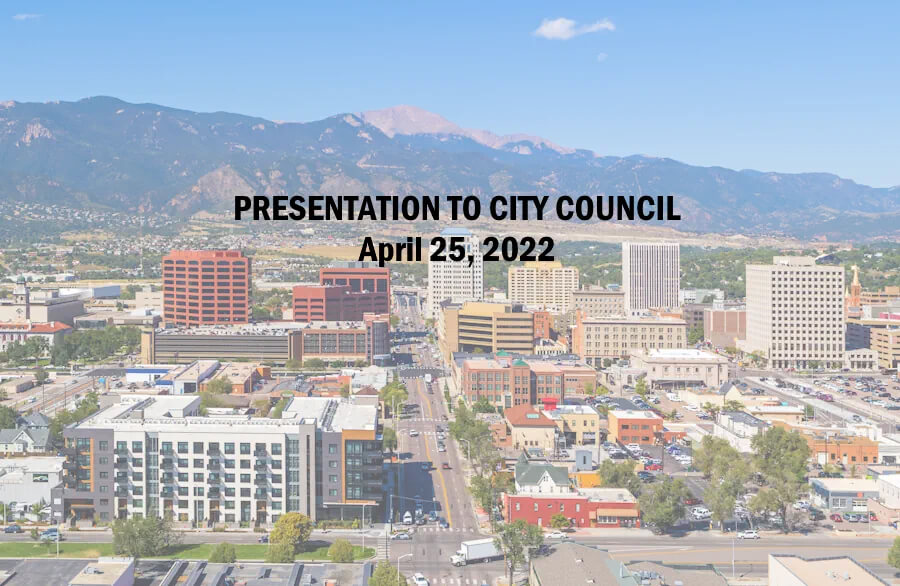 Aerial of downtown Colorado Springs with Pikes Peak in the background