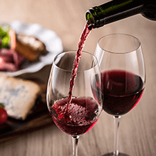 pouring glass of wine