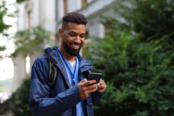 man looking at his phone