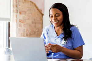 Female Nurse at Computer