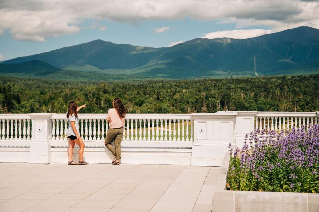 two women looking at mountain vista
