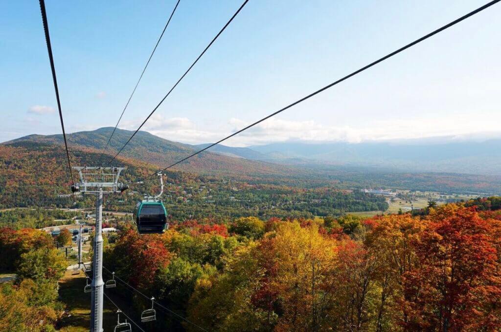 Bretton Woods gondola above fall foliage in the White Mountains.