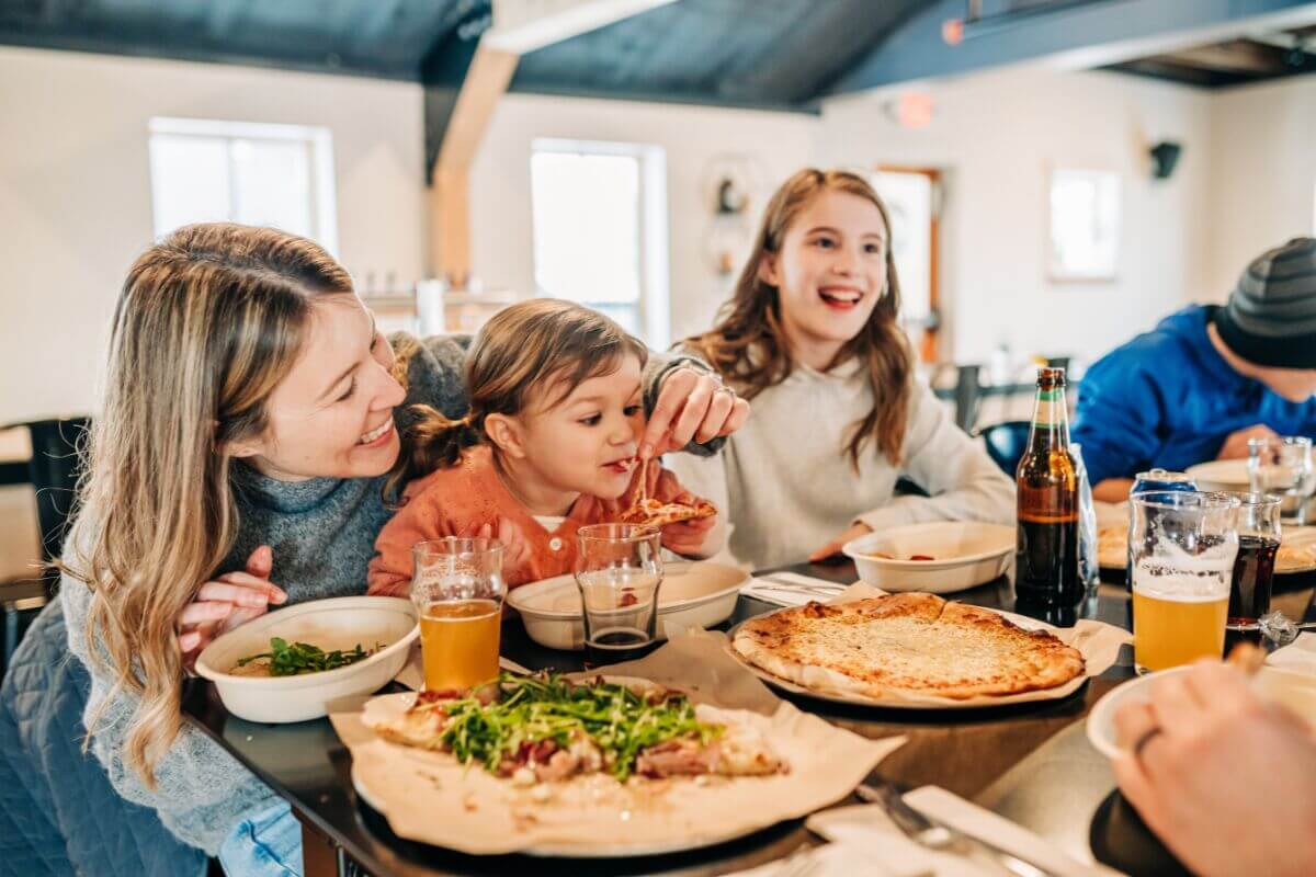 A family dining at Saco River Taphaus.