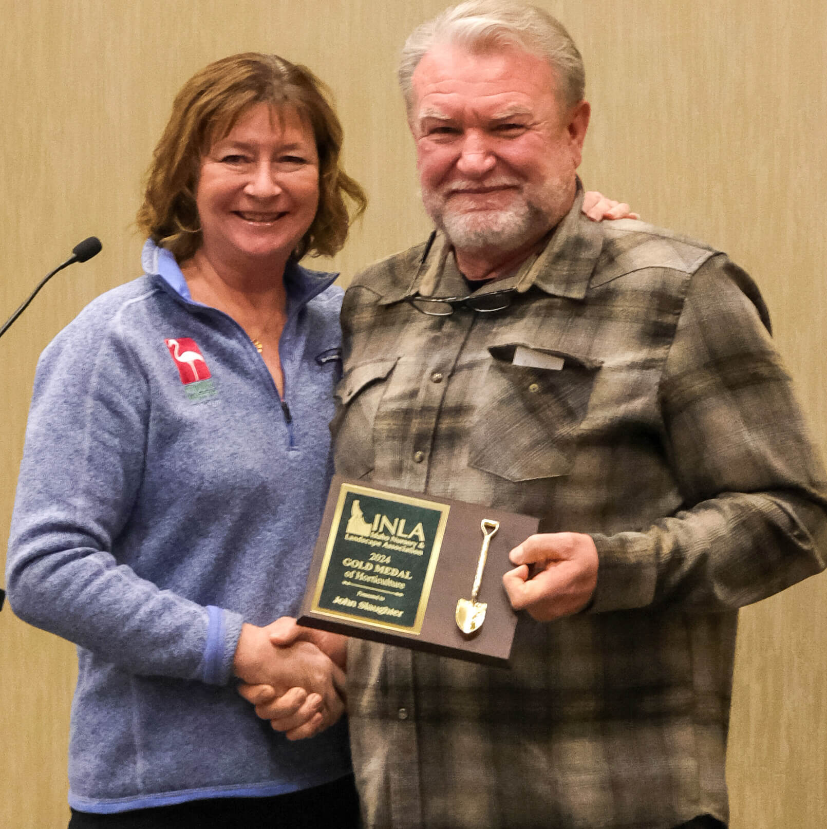 John Slaughter getting award