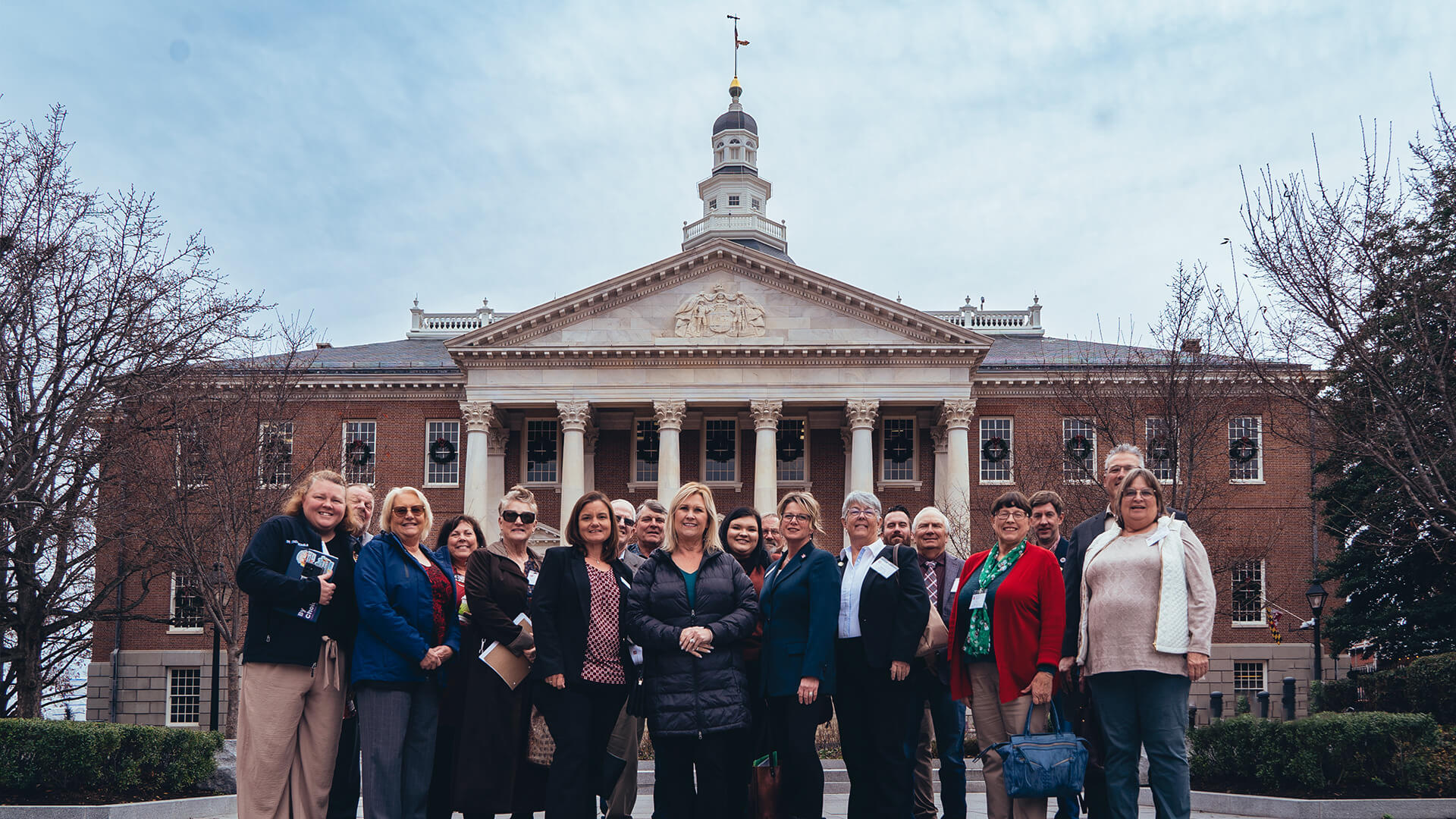 People standing in front of capitol building