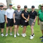 Volunteers putt