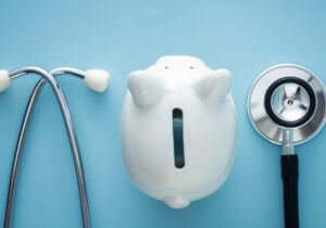 Piggy bank with stethoscope
