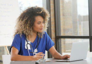 Nurse on computer