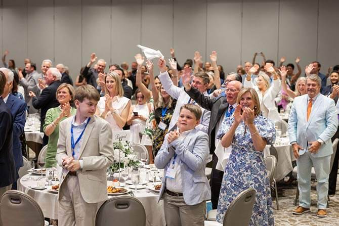 Congratulations-Tommy-McMath-4 la dealer of the year audience cheering