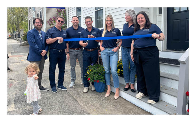 group photo ribbon cutting