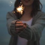 Woman holding sparkler