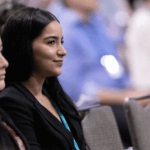 Attendee in the audience at an event