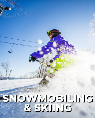 Snowmobiling Skiing