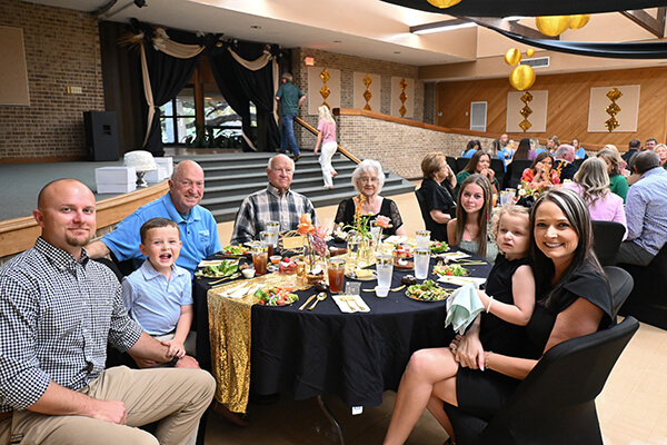 Dining Table with Smiling People